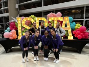 Members of the Burlington Dance Team pose for a photo at the Iowa State Dance and Drill Team Association.