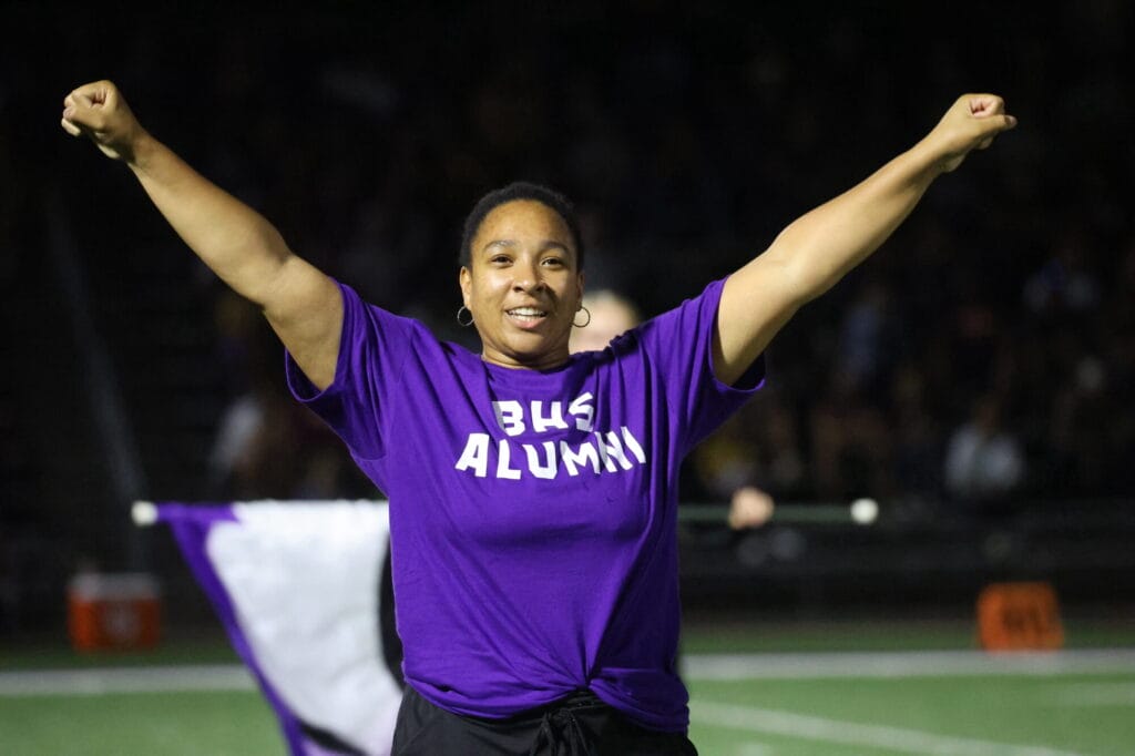 BHS Alum Samara Knotts performs alongside other alumni cheerleaders during the Grayhounds’ Homecoming game against Mount Pleasant Sept. 20, 2024, at Bracewell Stadium. 