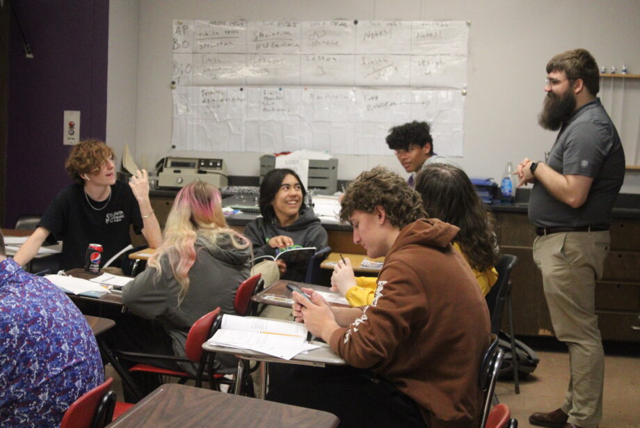 Nathaniel Roozeboom-Hemming talks to students Thursday, April 27, 2023, during Biology class at Burlington High School. Roozeboom-Hemming is in his fifth year of teaching at BHS and in his second year of teaching Biology using OpenSciEd, a pilot curriculum the Burlington Community School District has been field testing for the past six years.