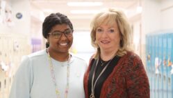 First-year teacher Michenna Davis poses for a photo alongside her teacher mentor, Tracy Walding, Nov. 25, 2024, outside of their third grade classrooms at North Hill Elementary School. They are among 37 mentees paired with 26 mentors this year via the district’s teacher mentor program.