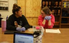 Students smile while practicing sanitization techniques Nov. 20, 2024, in Christa Whittemore’s Introduction to Cosmetology class at Burlington High School.