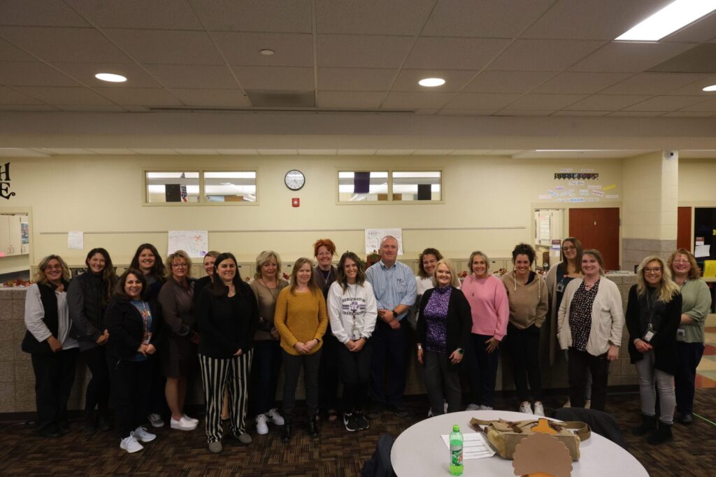 Teacher mentors pose for a photo Nov. 20, 2024, at Aldo Leopold Intermediate School.