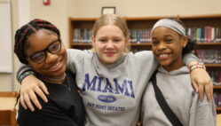 Seventh-graders Maleah Gilbert, Mya Wells and Jaziah Carter pose for a photo Sept. 24, 2024, in the library at Edward Stone Middle School. They learned lifelong lessons while in Girls Group last year, and highly recommend it for current and future fifth- and sixth-graders.