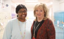 First-year teacher Michenna Davis poses for a photo alongside her teacher mentor, Tracy Walding, Nov. 25, 2024, outside of their third grade classrooms at North Hill Elementary School. They are among 37 mentees paired with 26 mentors this year via the district’s teacher mentor program.