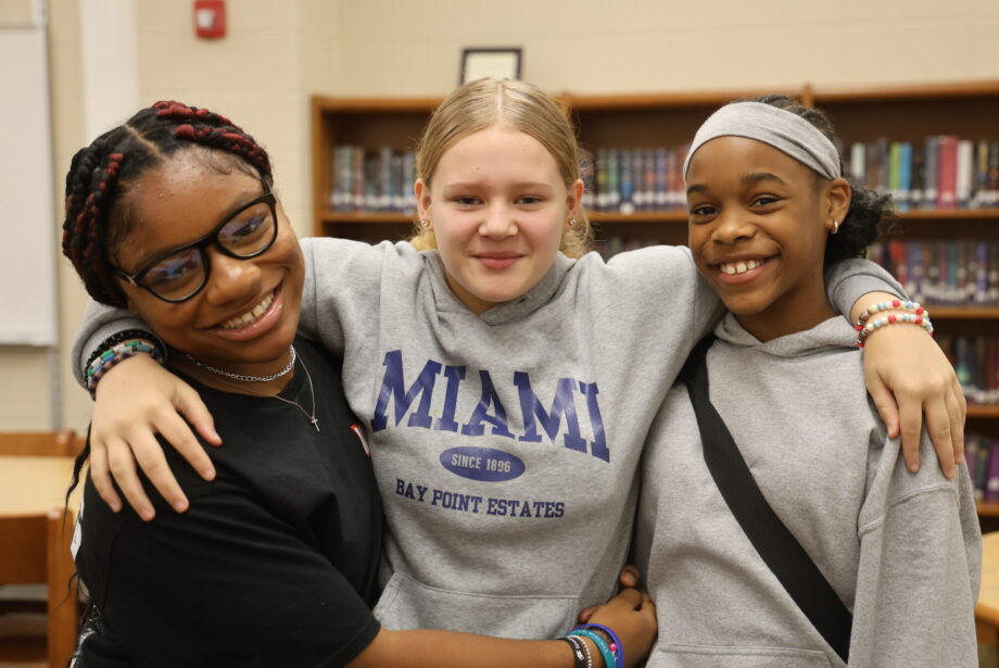 Seventh-graders Maleah Gilbert, Mya Wells and Jaziah Carter pose for a photo Sept. 24, 2024, in the library at Edward Stone Middle School. They learned lifelong lessons while in Girls Group last year, and highly recommend it for current and future fifth- and sixth-graders.