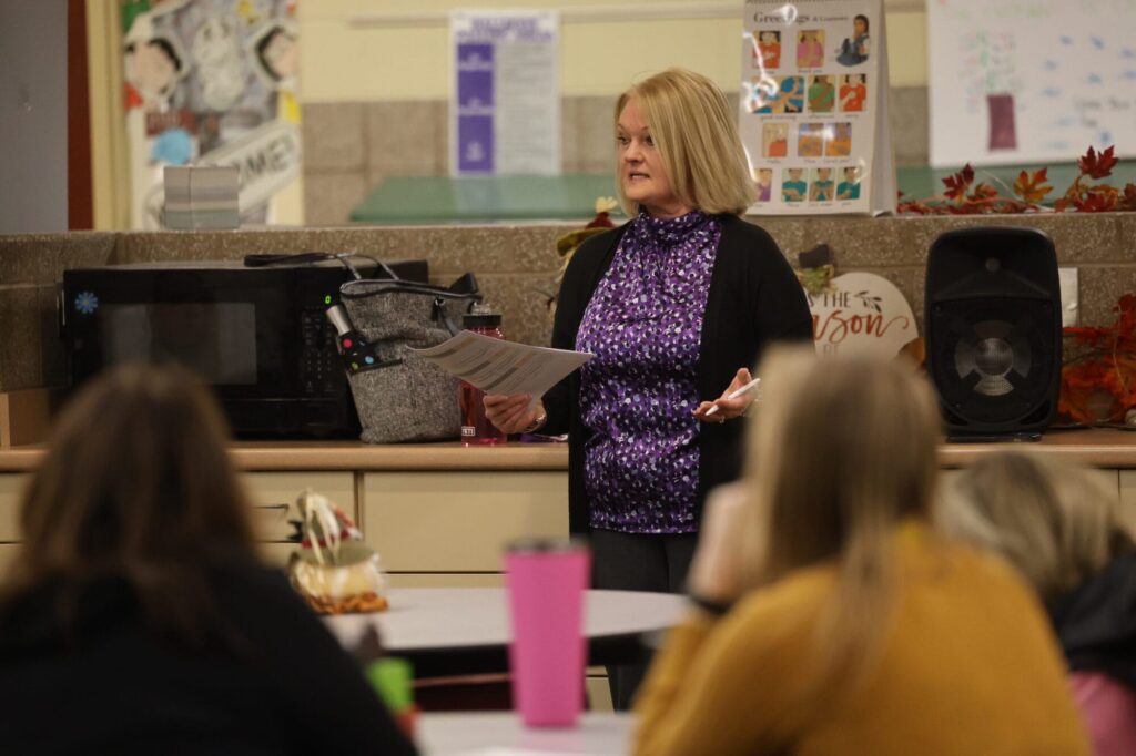 Teacher Leadership and Mentoring Coordinator Monica Mundt speaks during a mentor meeting at Aldo Leopold Intermediate School.